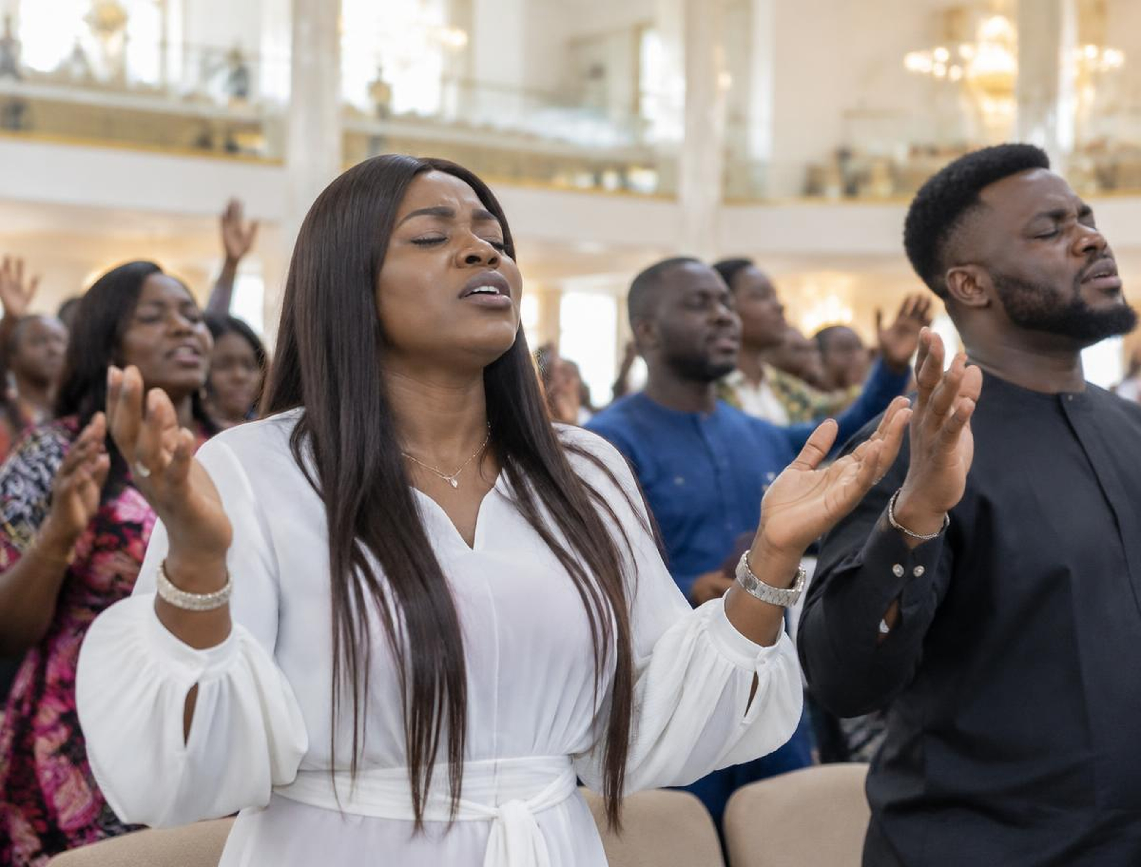 Congregation praying